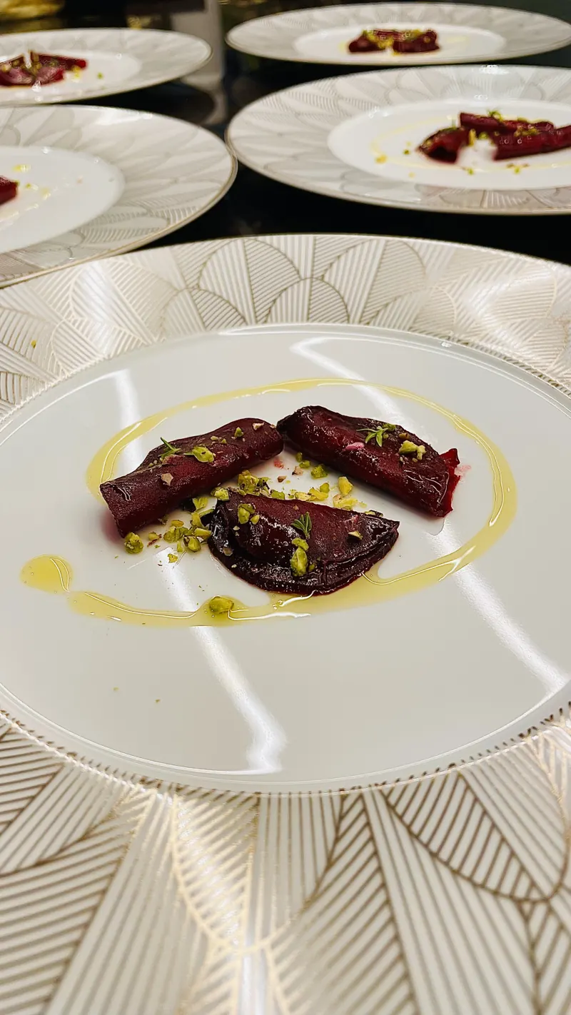 Beetroot ravioli, goat cheese, pistachio