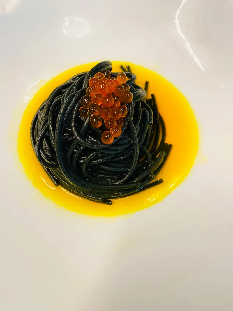 Squid ink spaghetti, salmon roe
